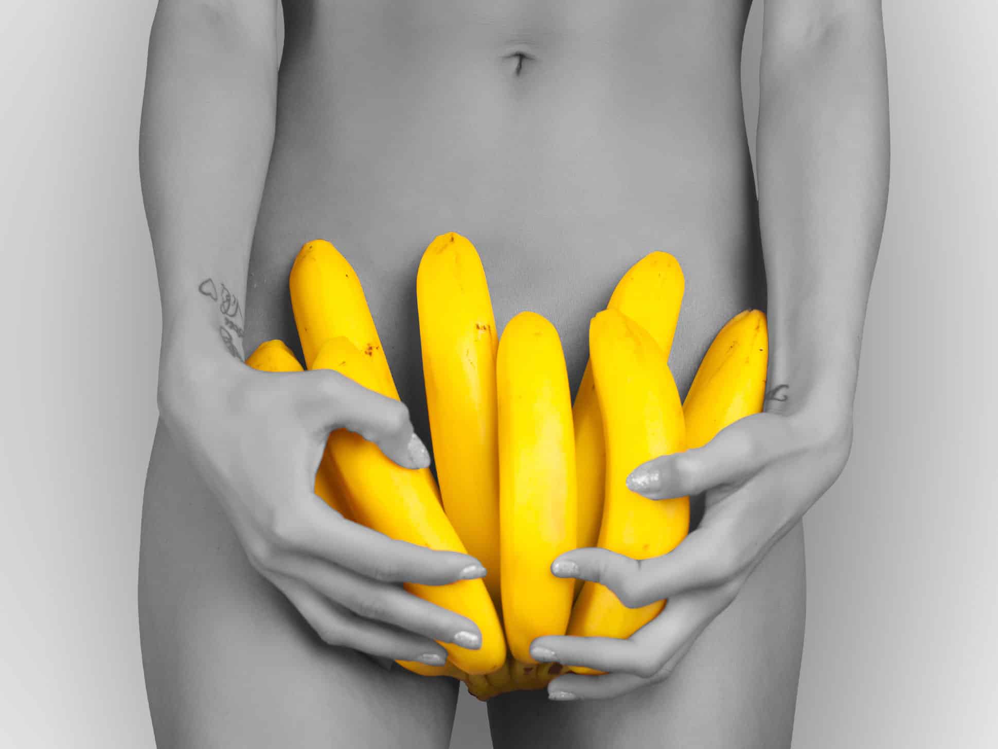 Woman poses with bananas